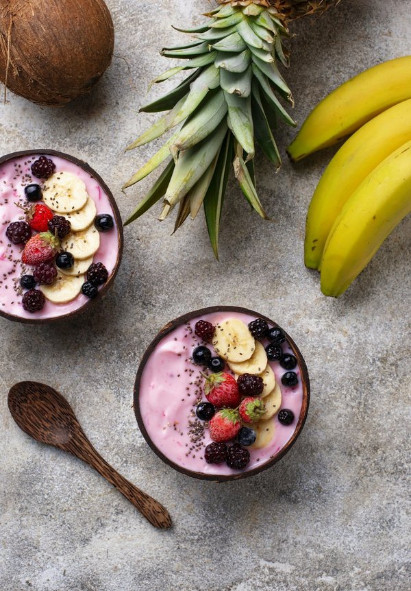 Qual è la ricetta per una torta di zucca speziata con frosting di formaggio cremoso?